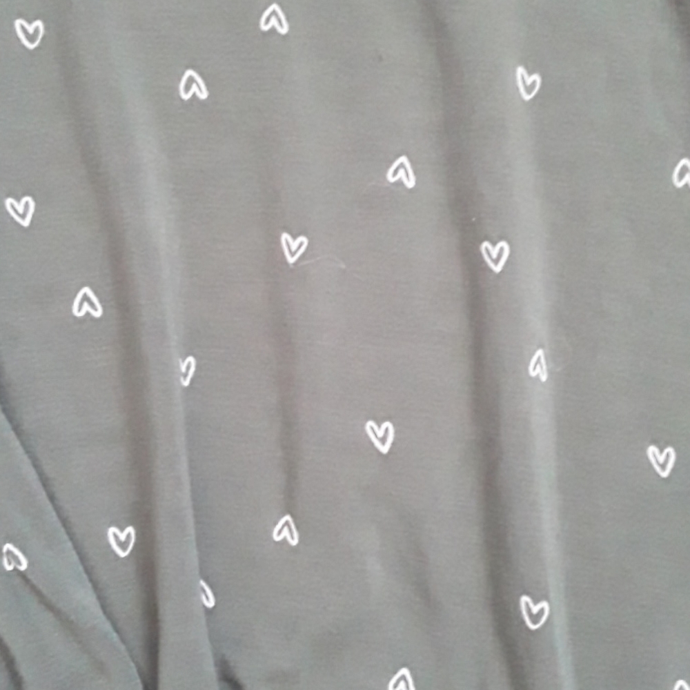Green top with white hearts